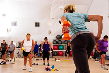 We Offer Corporate Group Health & Wellness Programs guests in fitness class